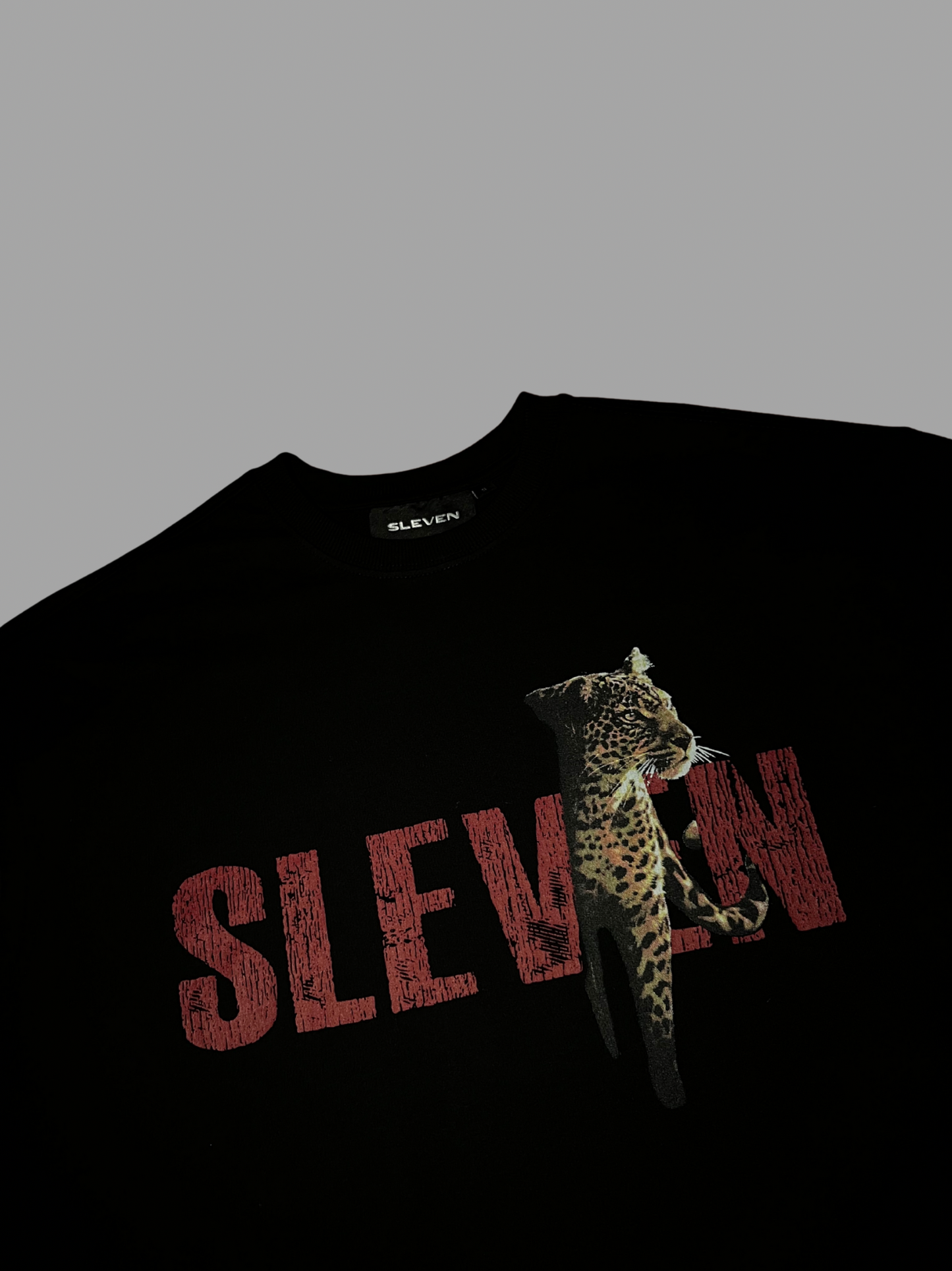 STRONGER THAN INSTINCTS OVERSIZED T-SHIRT (BLACK)