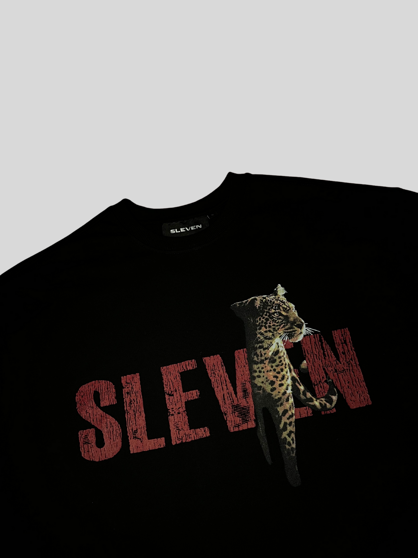 STRONGER THAN INSTINCTS OVERSIZED  T-SHIRT (BLACK)