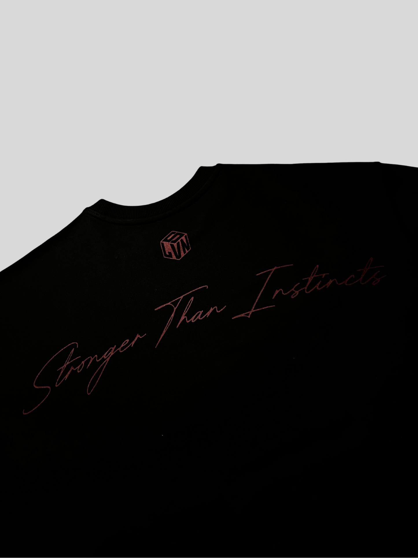 STRONGER THAN INSTINCTS OVERSIZED  T-SHIRT (BLACK)
